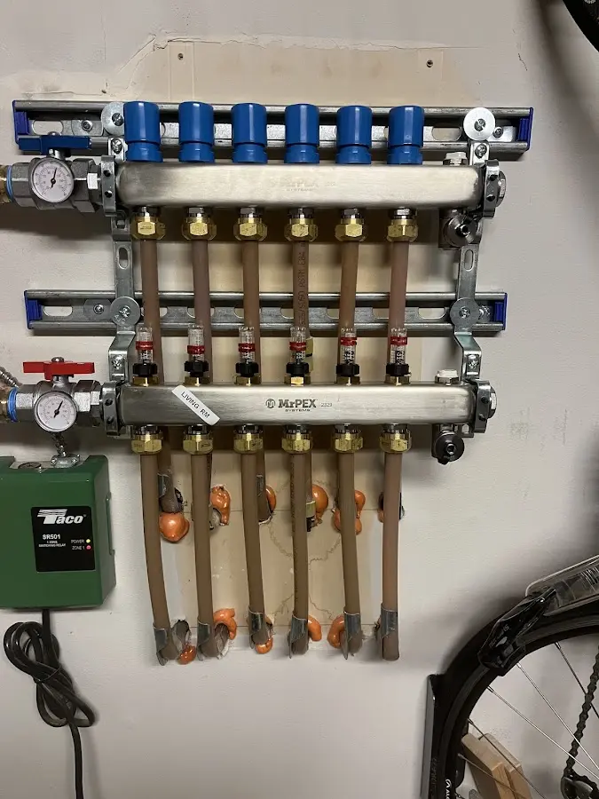 Plumber performing Water Heater Repair at a residential property in Mount Holly